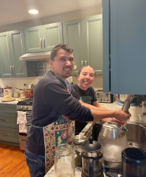 Connor, one of the founding friends at Riverflow, is pictured here making cookies with Izzy Shea.